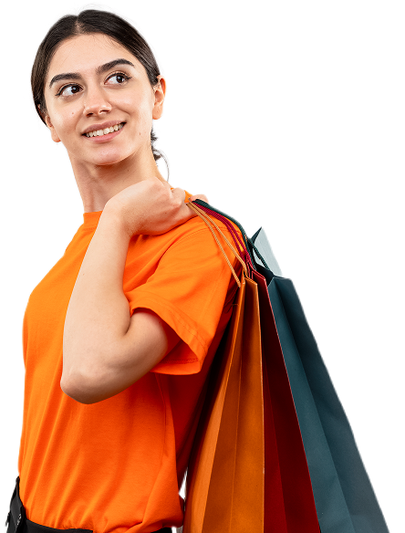 young-girl-wearing-orange-t-shirt-holding-paper-bags-looking-aside-with-hapy-face-smiling-cheerfully-standing-white-wall 1