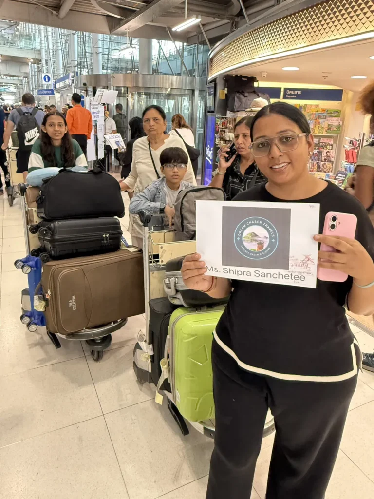 A Dream Chaser welcome board waiting for the family on arrival, Bangkok airport